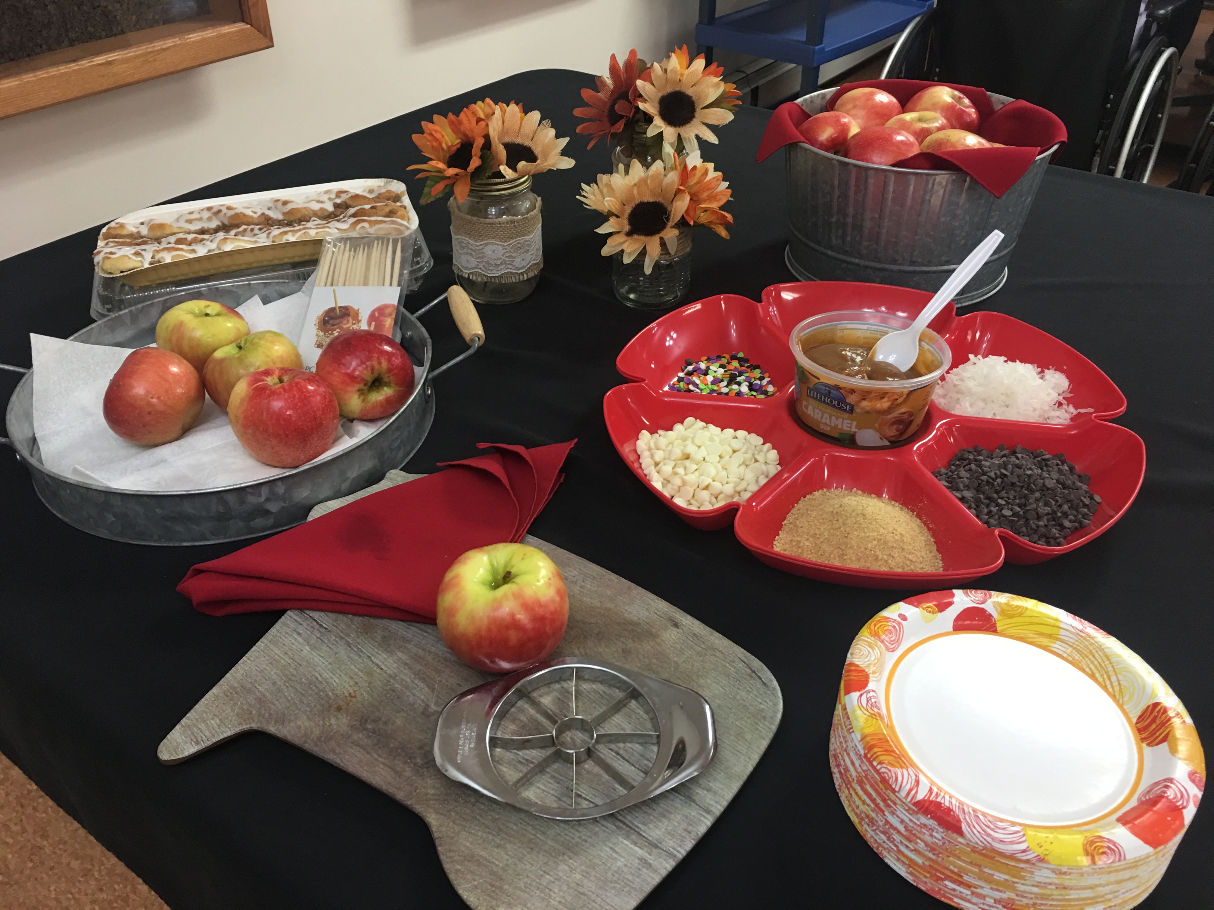 apples and toppings on table